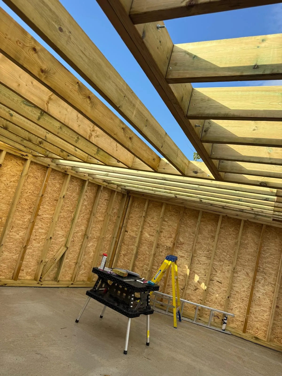 Garden room timber frame and OSB walls under construction