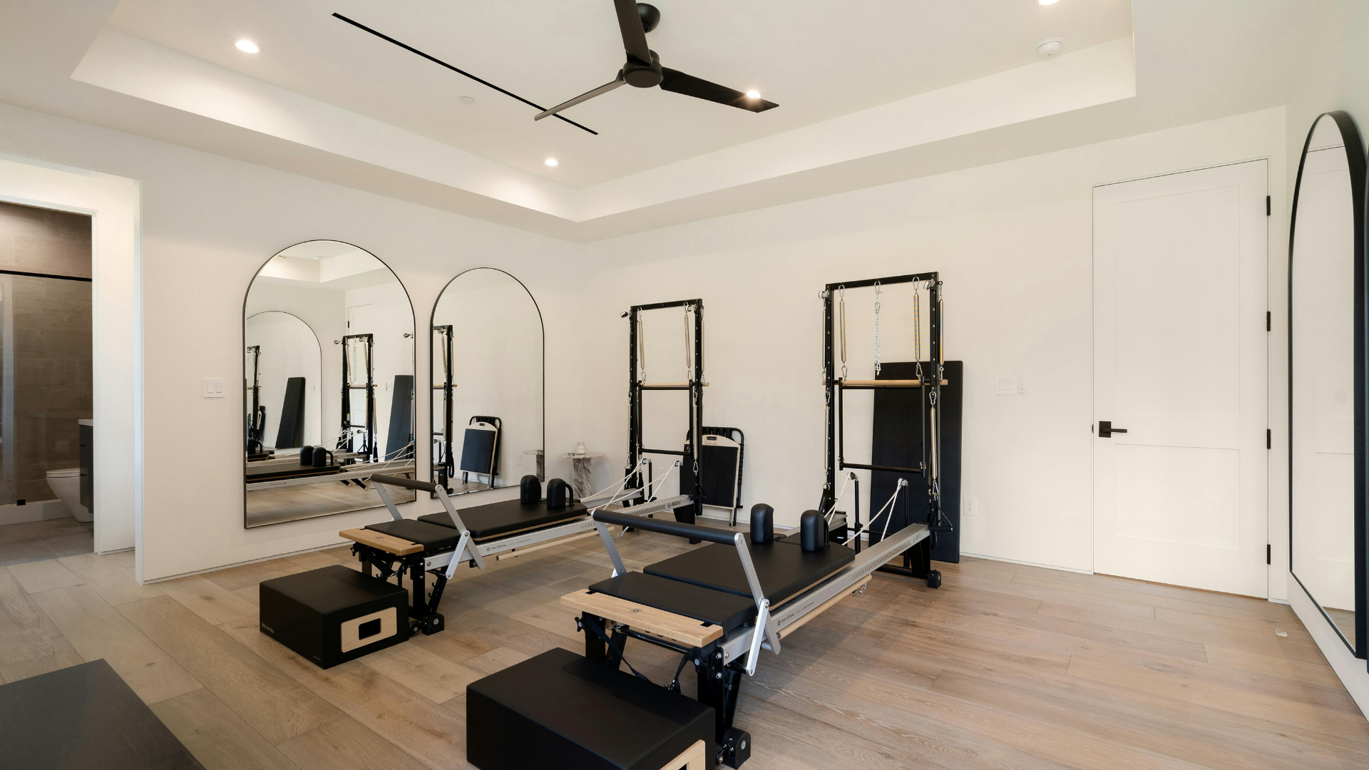 Garden gym with fitness equipment in a bespoke garden room