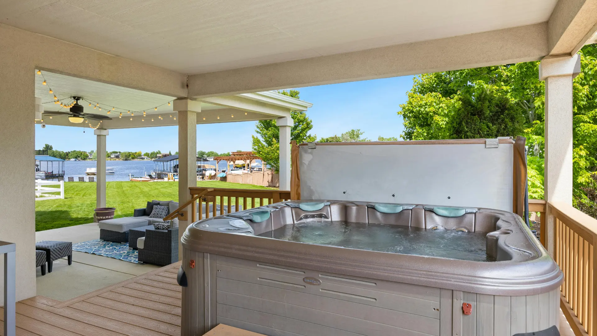 Timber hot tub shelter in a back garden